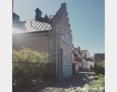 Lgenhet i Visby innerstad med utsikt ver hustak och hav