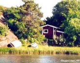 Enkel stuga vid havet