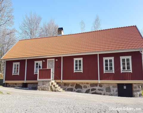 Mangårdsbyggnad vid sjön Raslången