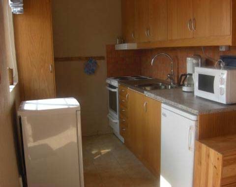 Kvarnhuset nära till stranden vid Mälarhusen